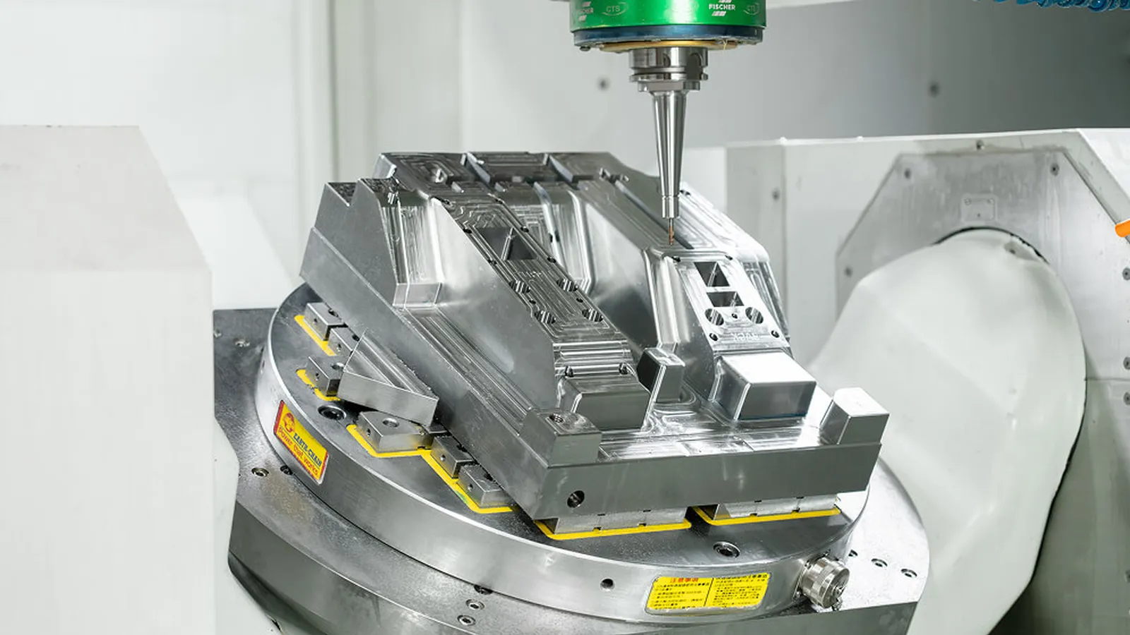 Injection molding press running a short production batch