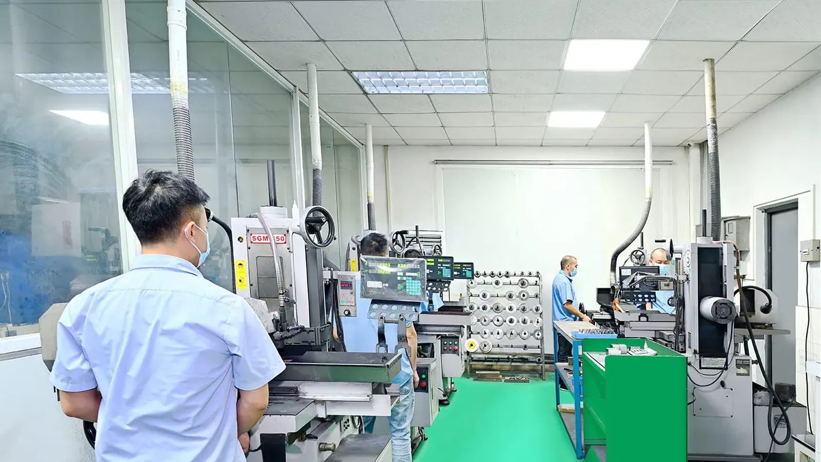 Surface grinder finishing overmold tool components